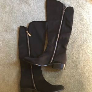Black cloth boots with zipper. Worn a few times.